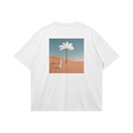 Back side view of Mirage T-shirt by Le Petit Marocain, sand desert inspired graphic, premium boxy fit streetwear in heavyweight cotton.