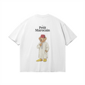 Back of white t-shirt featuring a detailed illustration of a teddy bear wearing a traditional Moroccan Djellaba and Fez, 'Le Petit Marocain' text, premium cultural streetwear.