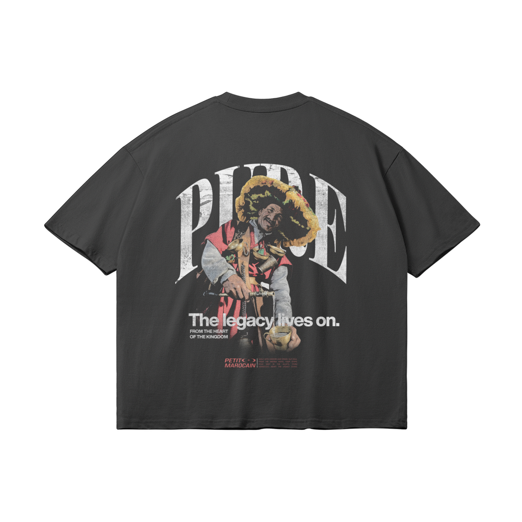 Back view of Guerrab traditional water seller graphic on premium black t-shirt, Le Petit Marocain, boxy fit streetwear.