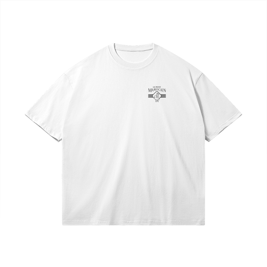 Front side of white graphic tee with a colorful traditional Moroccan Ronda card illustration (L'As d'Or) and 'Lass Lghenaz' script, boxy streetwear fit.