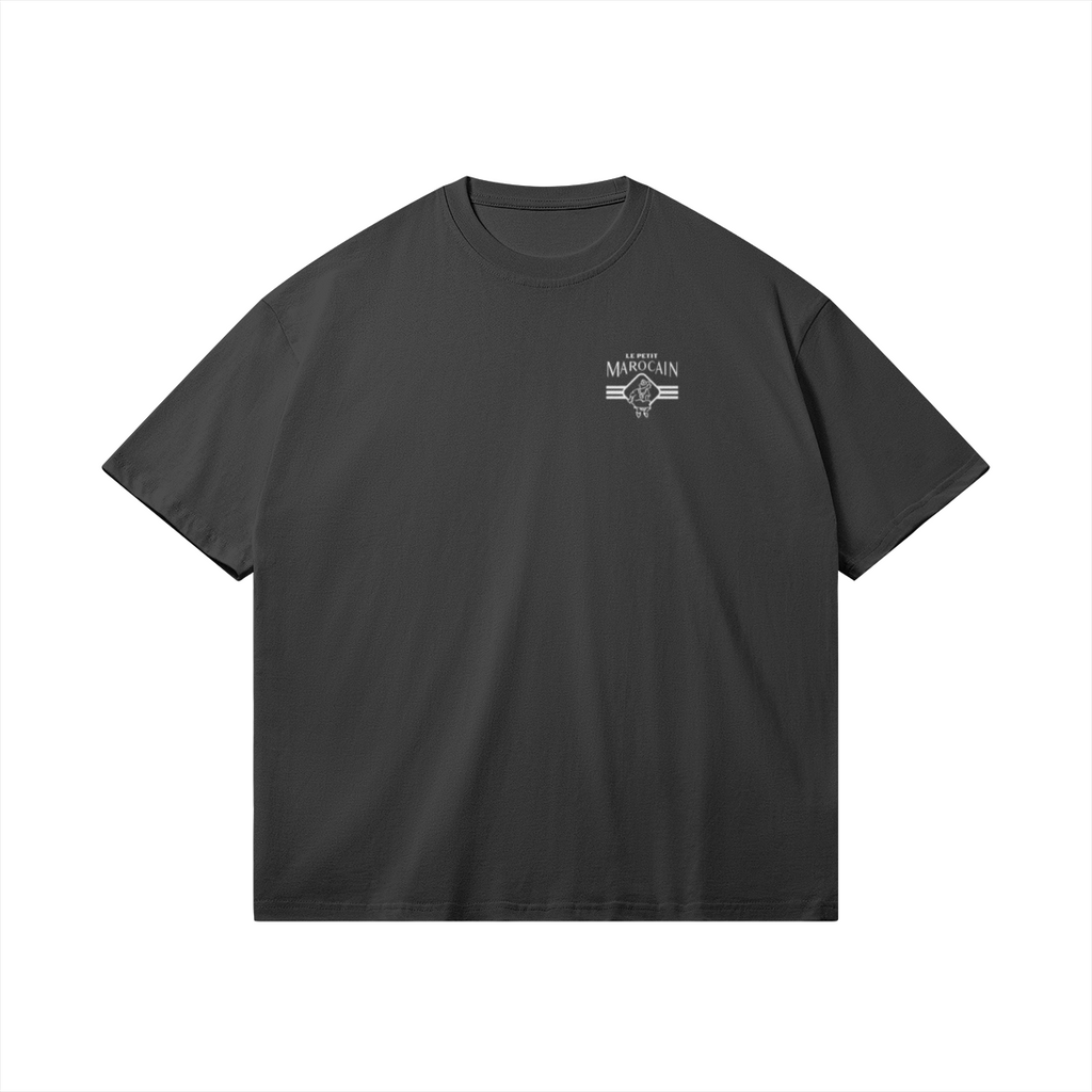 Front view of Bold red and clay Tajine graphic on premium black t-shirt, minimalist Moroccan streetwear, heavyweight boxy fit