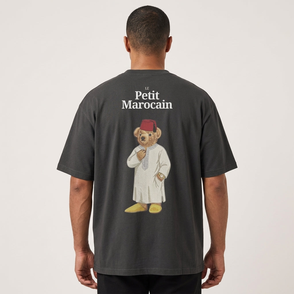 Person wearing a black t-shirt with a bear graphic and 'Le Petit Marocain' text on the back.